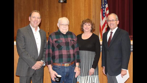 John Kuchenbecker was honored as WWII Veteran of the Month by the Rapid City Council. From left, Brett Estes, council member, John Kuchenbecker, Darla Drew, council member, and Mayor Steve Allender.