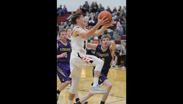 Brayden Price … going up for two against the Kadoka Kougars during the Varsity boys game on Saturday in Faith. Photo courtesy Alison Grueb