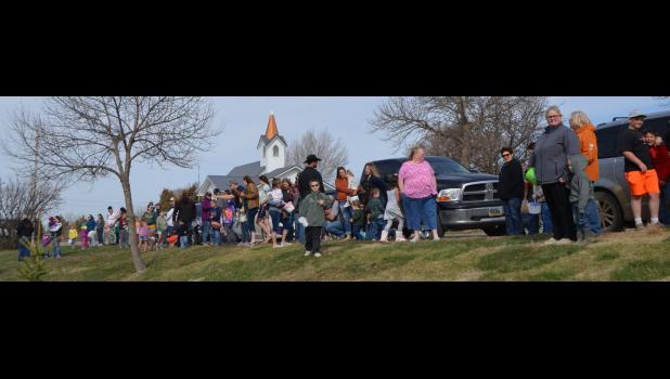 Ready, Set, Go ... everyone gathered and ready to hunt for Easter eggs. Photo courtesy Kim Bachman