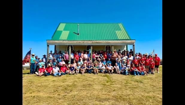 The families of Christ and Julia Besler and Samuel Besler, Sr. at the little prairie church below Rabbit Butte. Courtesy Photo
