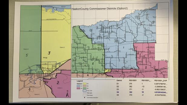 The South Dakota Legislature reset district boundaries that will take effect for the 2022 elections and continue through 2030. In Haakon County all affected voters will move from Precinct 1 into Precinct 20. The auditor’s office will make the changes to the system and the voters will not have to worry about the transition. Above is the county with the new districts mapped out. The table on the plans show the district population(P0010001), district deviation from ideal (p0010001_...) and the percent deviation from ideal (P0010001_DVP). (For a color image see www.RavellettePublications.com)