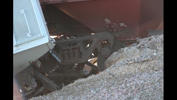 Up close shot of the twisted metal from the connecting trains that fell from the collapsed bridge structure.