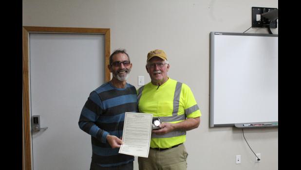 Mayor Mike Vetter stands proudly with Rick Coyle after reading the Mayoral Proclamation Declaring December 31, 2021 as Rickie “Rick” Coyle Day.