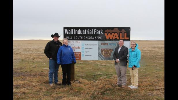 Wall Industrial Park committee members stand by the park sign and to the east of the 80 acres of land designated for the Industrial Park. Pictured are Josh Geigle, Mary Williams, Steve Edoff and Carolynn Anderson. Committee member not pictured is Dawn Hilgenkamp.