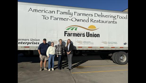South Dakota Farmers Union donated 35,000 pounds of pork on October 17 to Feeding South Dakota. Pictured here (left to right): Kevin Widmer, North Dakota Farmers Union Driver, Susanne Gale, Senior Development Officer, Feeding South Dakota; Karla Hofhenke, Executive Director, South Dakota Farmers Union and Megan Kjose, Chief Development Officer, Feeding South Dakota. Courtesy Photo