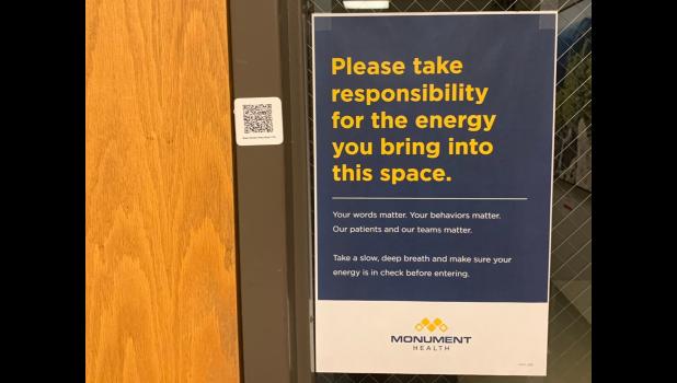 Posters like this one are present throughout Monument Hospital in Rapid City, urging visitors and employees to remain calm and respectful while in the facility. Courtesy Monument Health