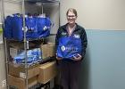 Health Equity Team Director, Haley Ehlers, and the Wellness Pantry provide a tote bag of nutritious food at the time of discharge for patients in need. Courtesy Photo